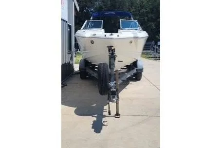 Slide: The Image of 2008 Chaparral Sunesta 224 boat on trailer, parked outdoors. - 4