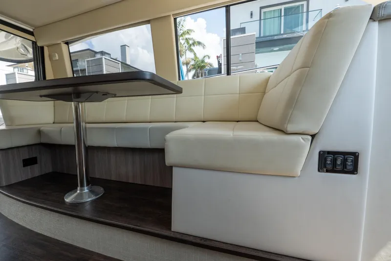 Slide: The Image of Luxurious interior seating area of 2022 Regal 42 XO yacht with modern design. - 33
