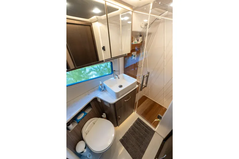 Slide: The Image of Luxurious bathroom in 2022 Regal 42 XO yacht with modern fixtures and elegant design. - 50