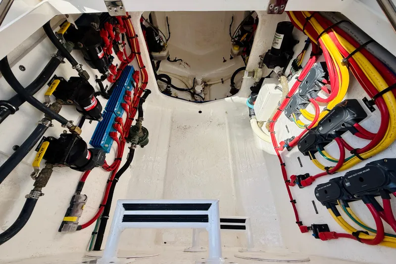 Slide: The Image of Engine compartment of a 2021 Intrepid 410 Evolution with detailed wiring and components. - 51
