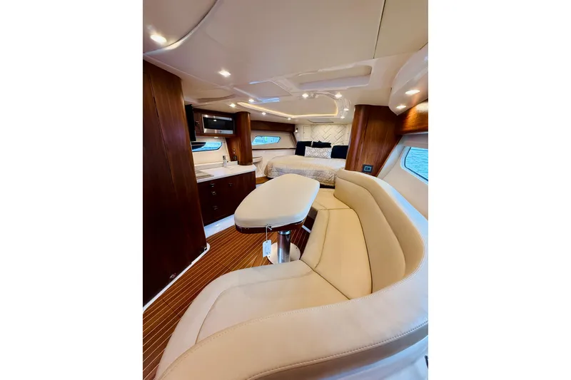 Slide: The Image of Luxurious interior of 2021 Intrepid 410 Evolution yacht with elegant seating and modern amenities. - 38
