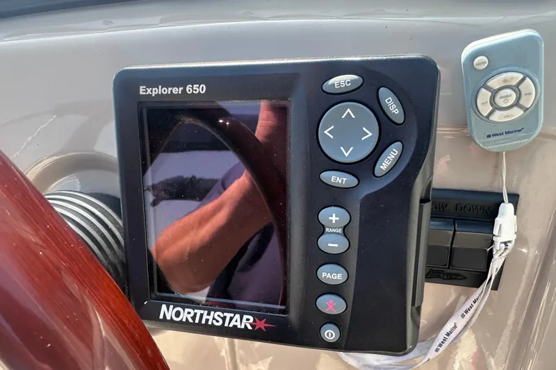 Slide: The Image of Northstar Explorer 650 GPS on 1999 Chaparral Signature 240 boat dashboard. - 18