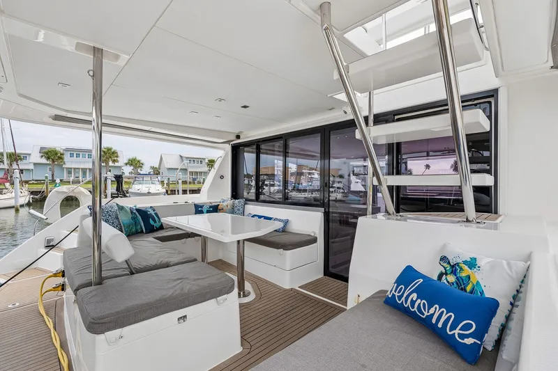 Slide: The Image of Luxurious 2021 Leopard 43 Powercat yacht interior with modern seating and stylish decor. - 3