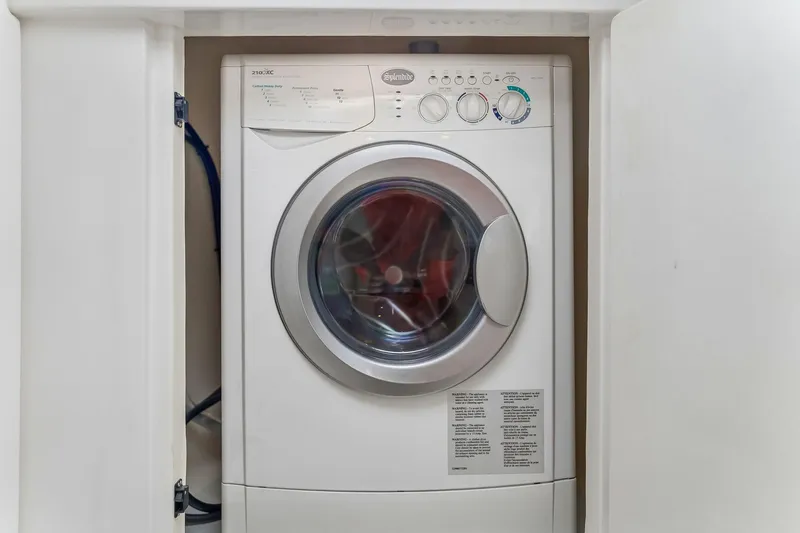 Slide: The Image of Front-loading washing machine in a Leopard 43 Powercat 2021 model yacht. - 50