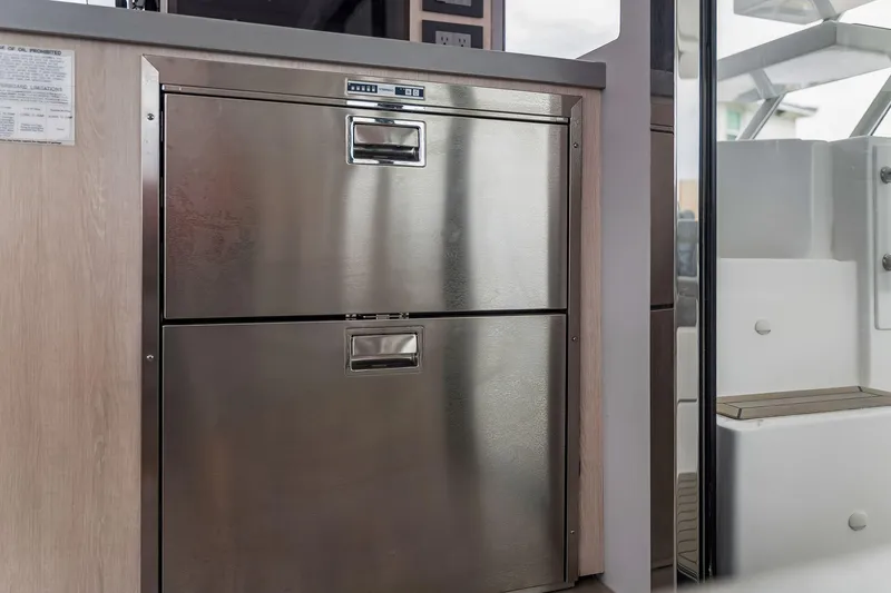 Slide: The Image of Stainless steel drawers in 2021 Leopard 43 Powercat interior, showcasing modern yacht design. - 29
