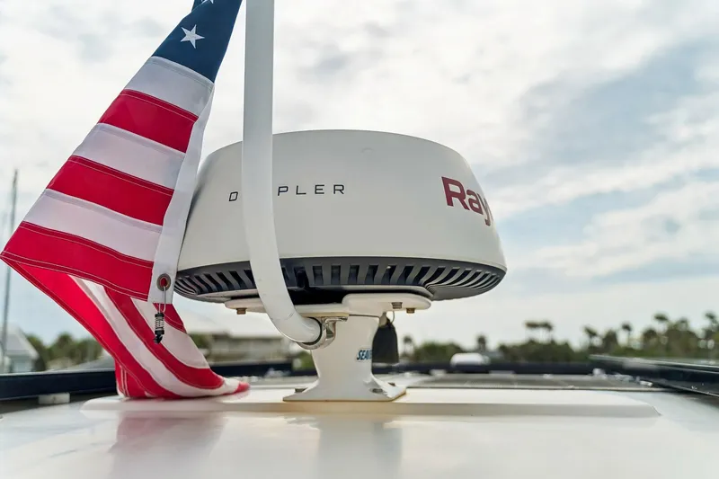 Slide: The Image of Radar system on 2021 Leopard 43 Powercat with American flag in background. - 10