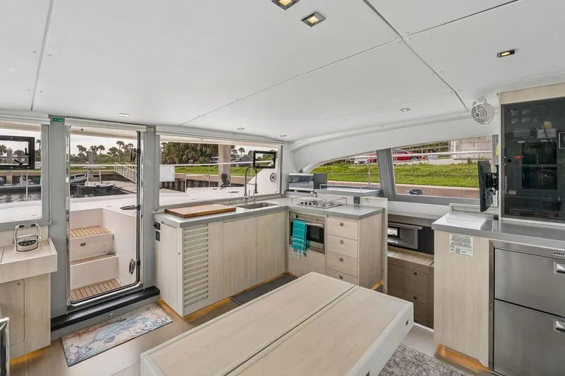 Slide: The Image of Modern interior of 2021 Leopard 43 Powercat yacht with spacious kitchen and dining area. - 27
