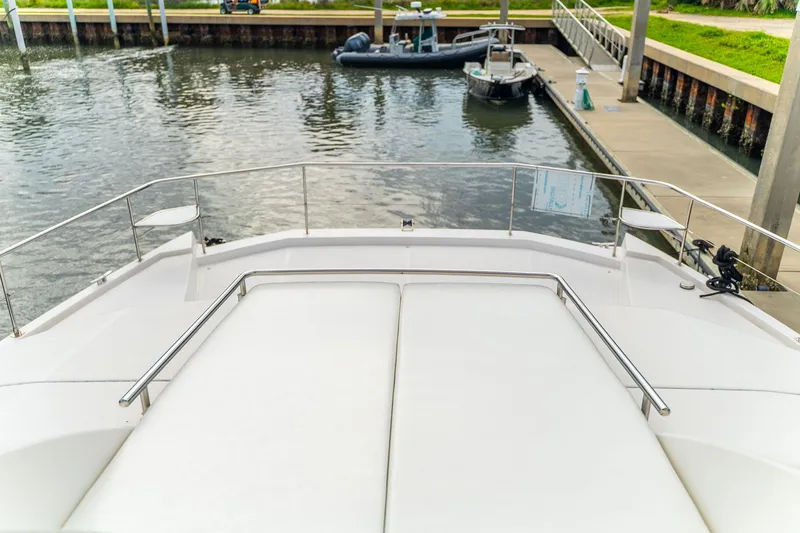 Slide: The Image of Front deck of a 2021 Leopard 43 Powercat docked at a marina. - 8