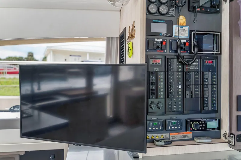 Slide: The Image of Control panel and monitor inside a 2021 Leopard 43 Powercat yacht. - 31