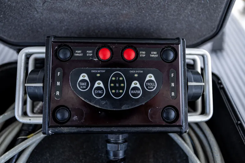 Slide: The Image of Close-up of a control panel with various buttons and indicators. - 40