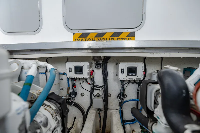 Slide: The Image of Interior view of the engine room in a 2019 Newton 36' Dive Special boat. - 34