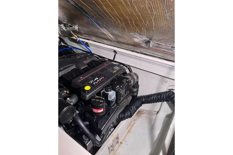 Slide: The Image of Engine compartment of a 2000 Pursuit 2860 Denali boat with 7.4 MPI engine. - 18