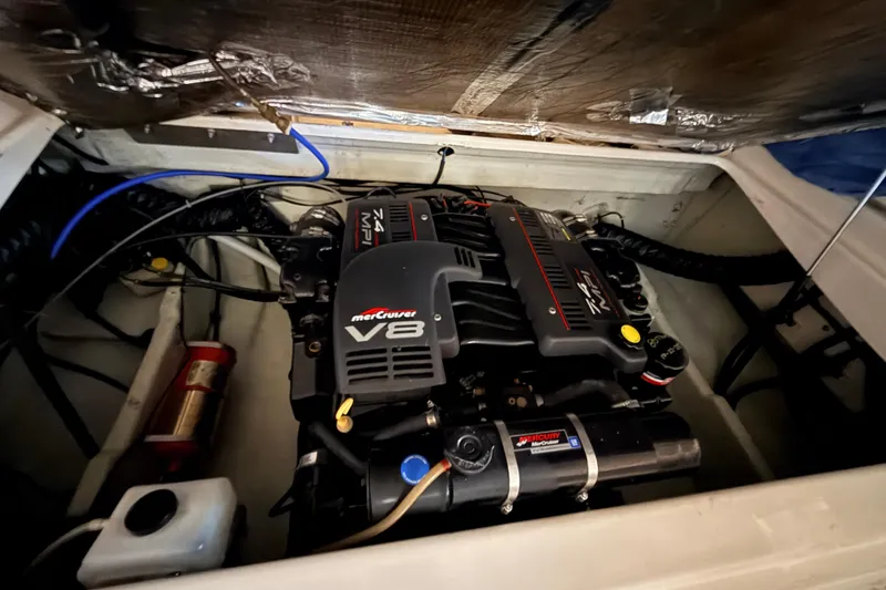 Slide: The Image of Engine compartment of a 2000 Pursuit 2860 Denali with MerCruiser V8 engine. - 20