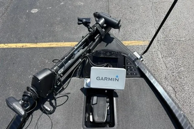 Slide: The Image of 2023 Caymas CX 20 PRO boat with Garmin navigation system on deck. - 33