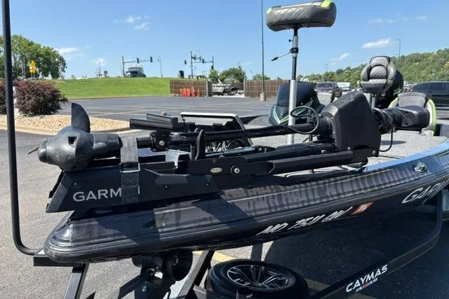Slide: The Image of 2023 Caymas CX 20 PRO boat with Garmin equipment, parked outdoors on a sunny day. - 36
