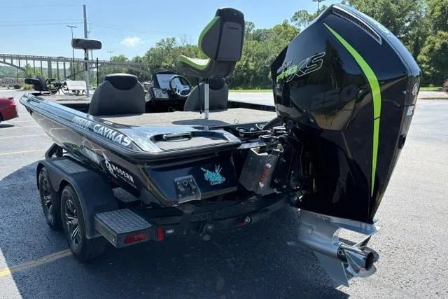 Slide: The Image of 2023 Caymas CX 20 PRO boat with powerful engine, parked outdoors. - 4