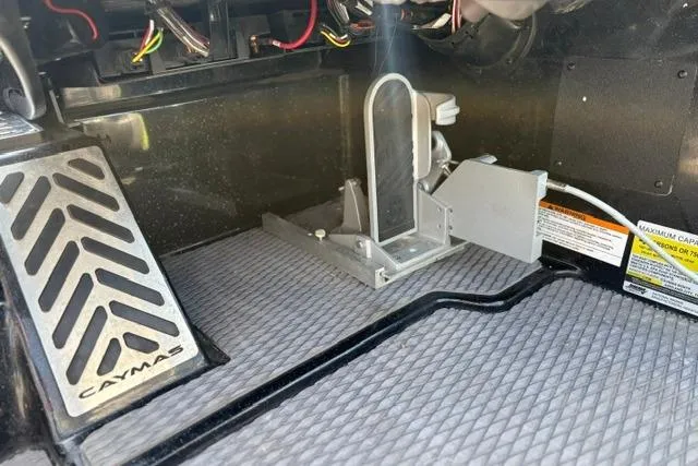 Slide: The Image of Interior view of 2023 Caymas CX 20 PRO boat, showcasing foot pedal and wiring. - 25