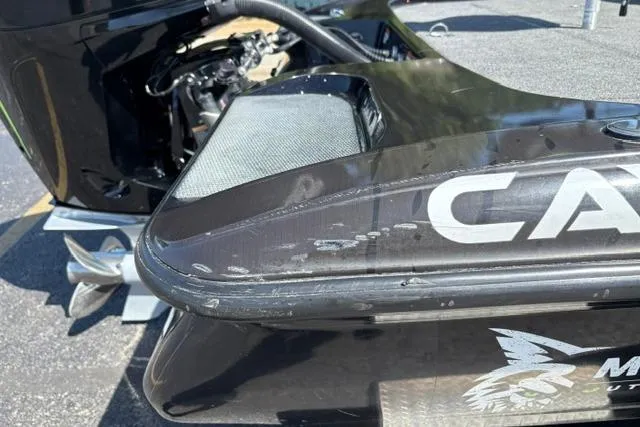 Slide: The Image of 2023 Caymas CX 20 PRO boat rear view with visible engine and logo. - 45