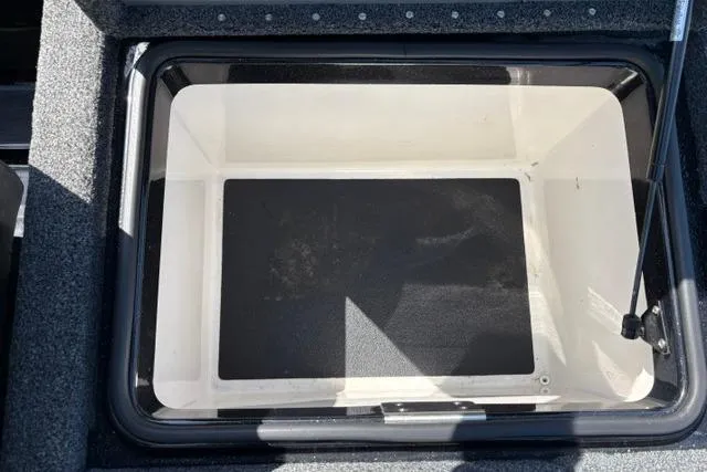 Slide: The Image of 2023 Caymas CX 20 PRO storage compartment with open lid, showcasing spacious interior. - 17