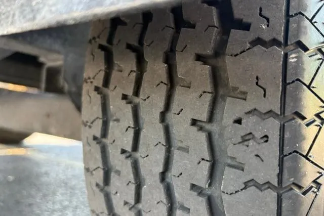 Slide: The Image of Close-up of a 2023 Caymas CX 20 PRO tire tread pattern. - 57