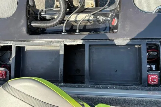 Slide: The Image of 2023 Caymas CX 20 PRO boat interior showing battery compartments and wiring setup. - 43