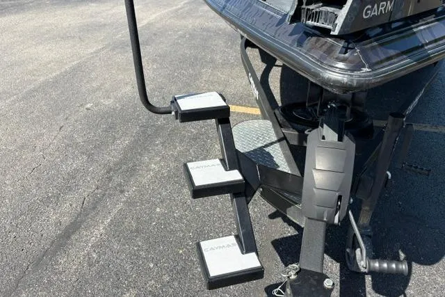 Slide: The Image of 2023 Caymas CX 20 PRO boat trailer with step ladder and Garmin equipment. - 38