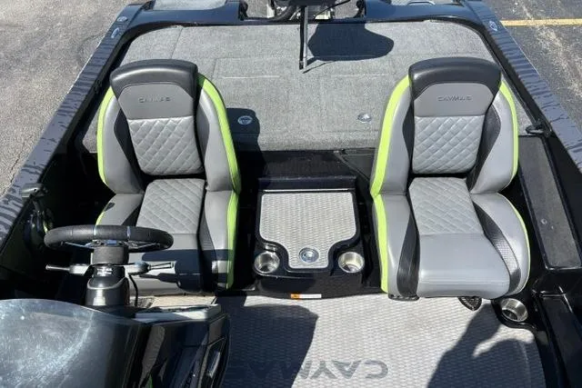 Slide: The Image of 2023 Caymas CX 20 PRO boat interior with gray and green seats. - 31