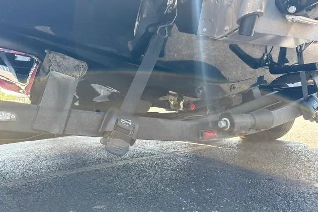 Slide: The Image of 2023 Caymas CX 20 PRO trailer suspension detail with sunlight reflections. - 46