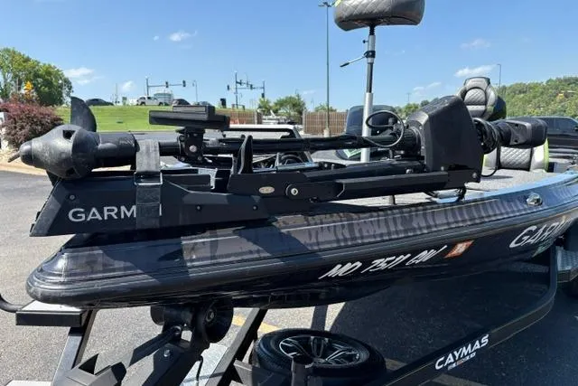 Slide: The Image of 2023 Caymas CX 20 PRO boat with Garmin equipment, parked outdoors on a sunny day. - 35