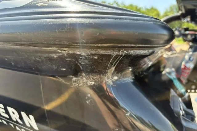 Slide: The Image of Close-up of 2023 Caymas CX 20 PRO boat hull with visible scratches. - 39