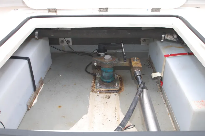 Slide: The Image of Interior view of a boat's engine compartment with tanks and mechanical parts. - 28