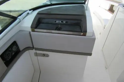 Slide: The Image of 2011 Sea Ray SLX 250 boat interior, featuring sleek dashboard and control panel. - 28