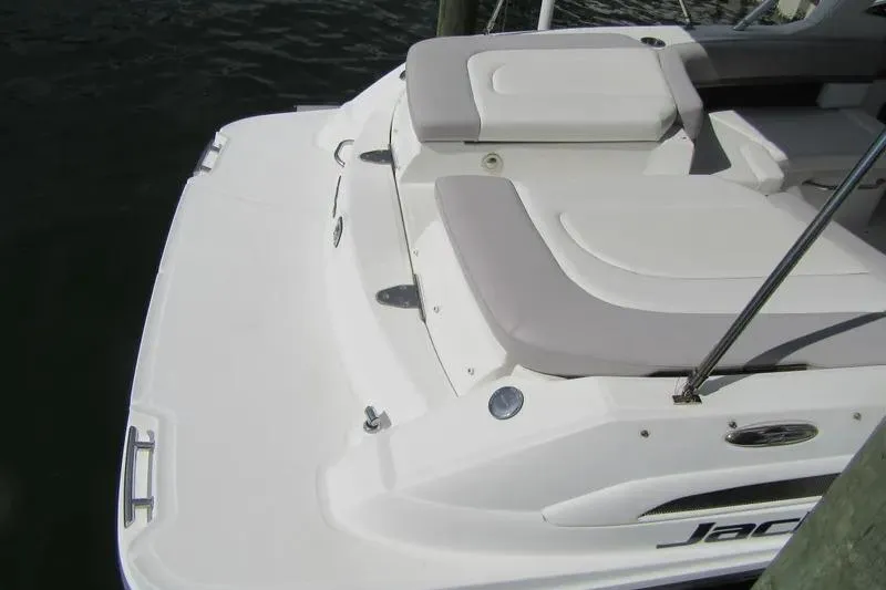 Slide: The Image of 2011 Sea Ray SLX 250 boat with spacious rear seating and swim platform. - 37
