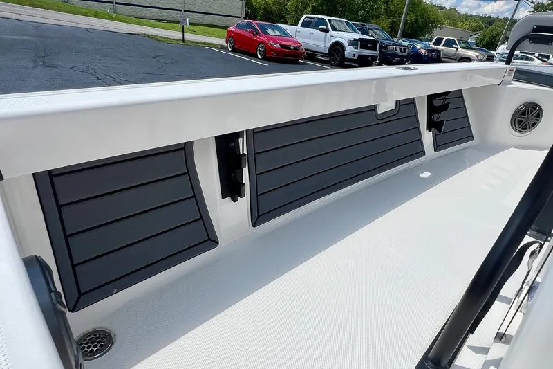 Slide: The Image of 2027 Pathfinder 2200 TRS boat interior with sleek storage compartments and modern design. - 23