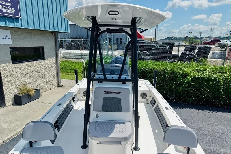 Slide: The Image of 2027 Pathfinder 2200 TRS boat at dealership, featuring sleek design and modern amenities. - 28