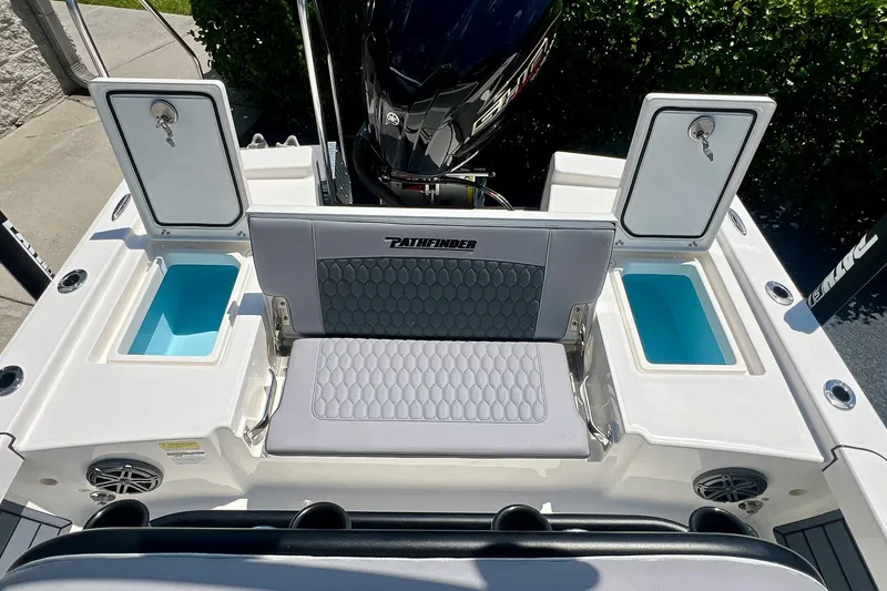 Slide: The Image of 2027 Pathfinder 2200 TRS boat interior with seating and storage compartments. - 15