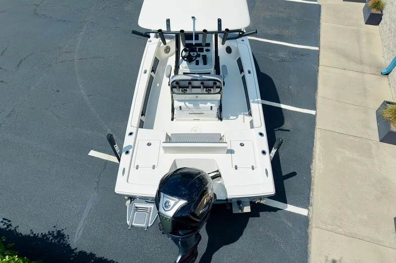 Slide: The Image of Aerial view of 2027 Pathfinder 2200 TRS boat in parking lot. - 13