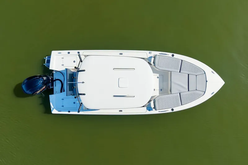Slide: The Image of Aerial view of 2027 Pathfinder 2200 Hybrid boat on calm green water. - 14