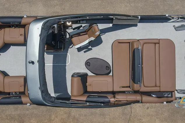 Slide: The Image of 2022 South Bay 523 SB2 ARCH pontoon boat interior with brown seating and sleek design. - 23