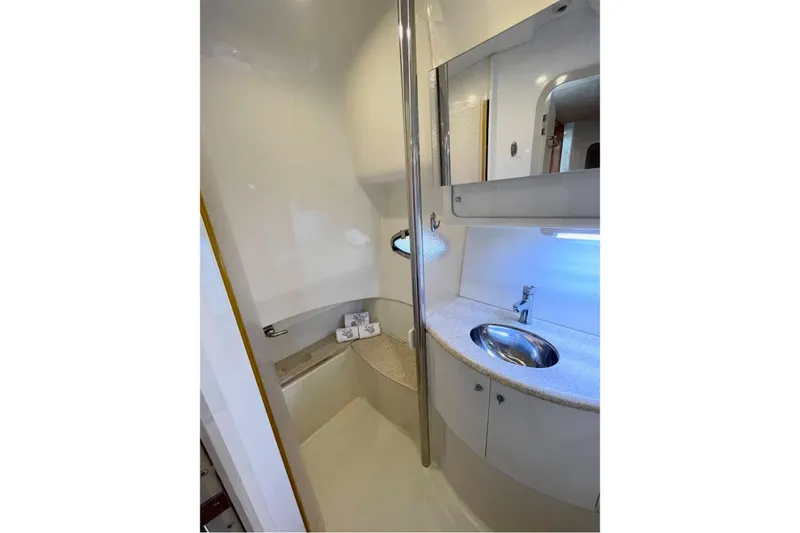 Slide: The Image of Bathroom interior of 2003 Formula 40 Performance Cruiser with sink and mirror. - 6
