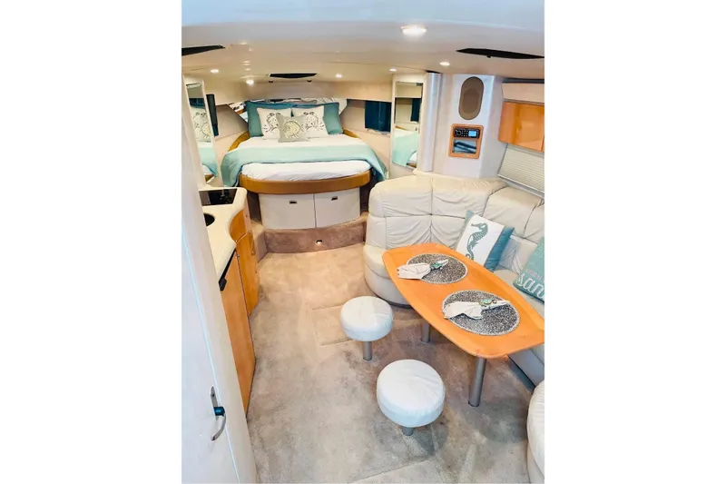 Slide: The Image of Luxurious interior of a 2003 Formula 40 Performance Cruiser with cozy seating and elegant decor. - 11