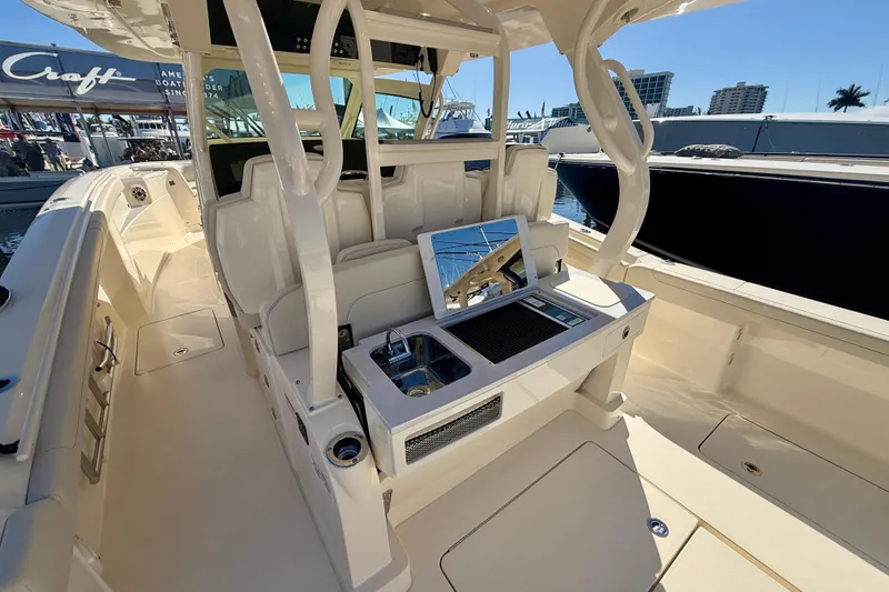 Slide: The Image of Luxurious interior of 2026 Scout 400 LXF boat with modern amenities and sleek design. - 8
