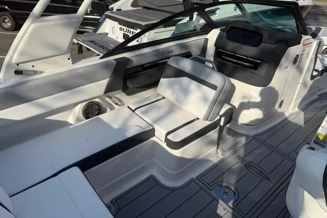 Slide: The Image of 2026 Chaparral SSX 4 boat interior with sleek seating and modern design. - 13