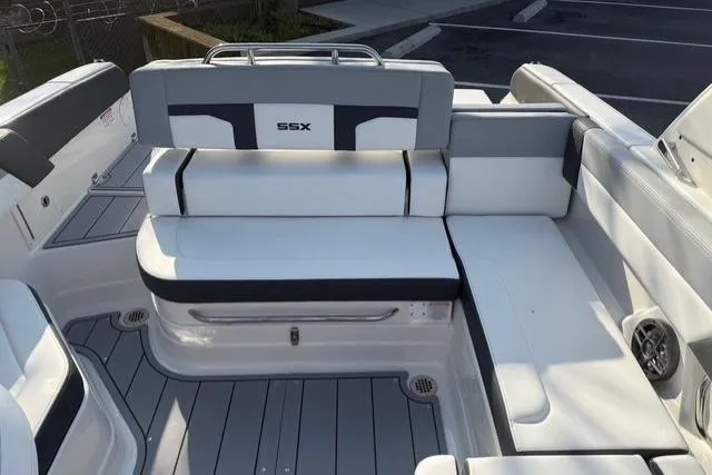 Slide: The Image of 2026 Chaparral SSX 4 boat interior with sleek seating and modern design. - 5