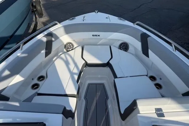 Slide: The Image of 2026 Chaparral SSX 4 boat interior with sleek seating and modern design. - 7