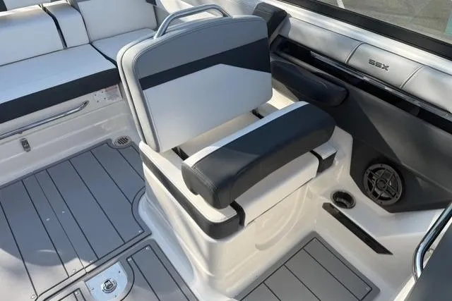 Slide: The Image of 2026 Chaparral SSX 4 boat interior with sleek seating and modern design. - 11
