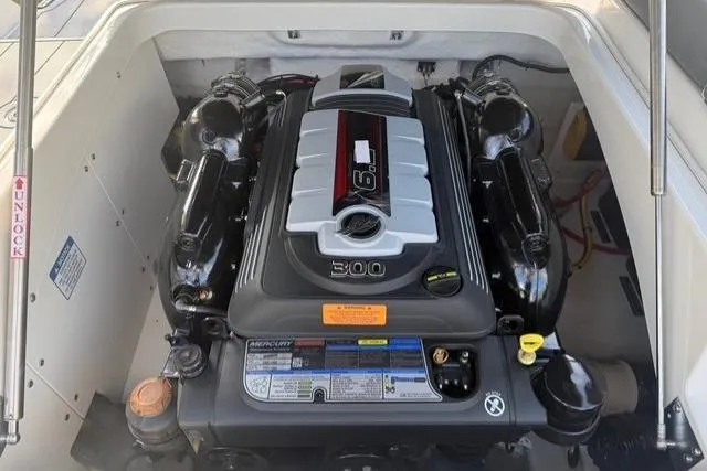 Slide: The Image of Engine compartment of 2026 Chaparral SSX 4 boat, featuring a powerful 300 horsepower engine. - 19