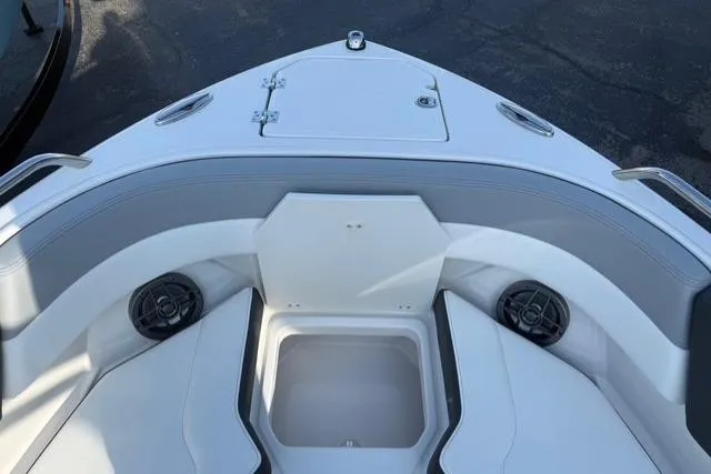 Slide: The Image of 2026 Chaparral SSX 4 boat bow with seating and storage compartment. - 10
