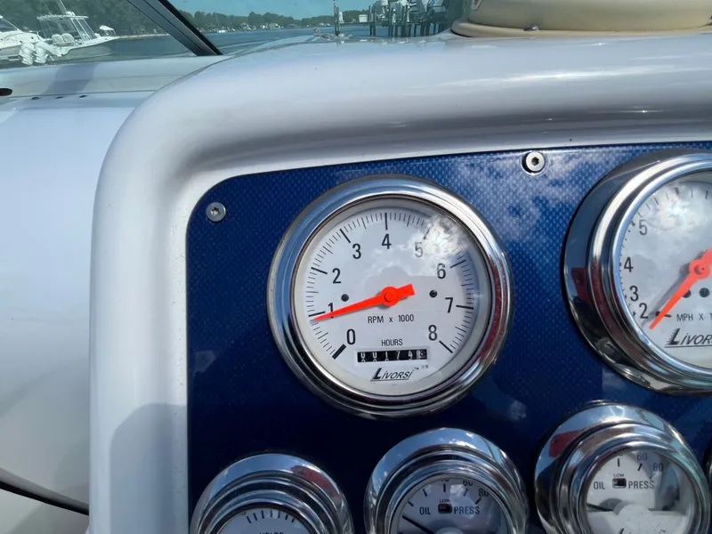 Slide: The Image of Close-up of boat instruments with tachometer and oil pressure gauges. - 7