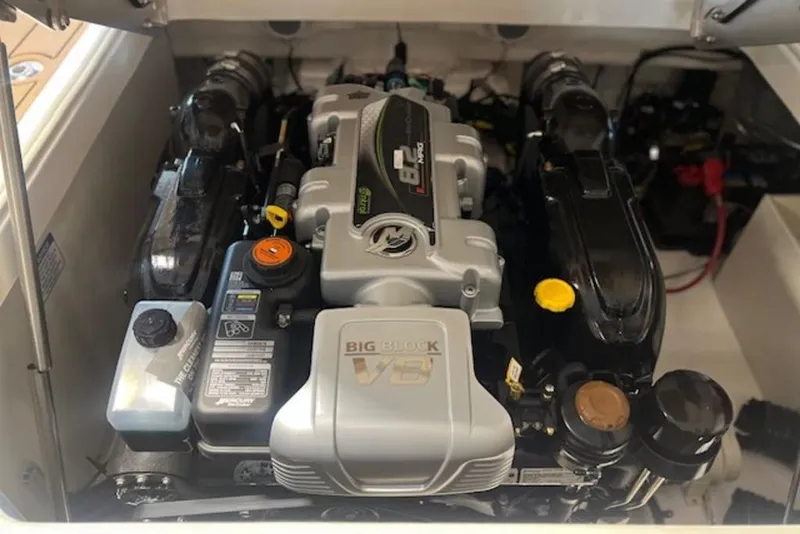 Slide: The Image of 2025 Chaparral 2870 SSX engine compartment showcasing powerful V8 engine components. - 13